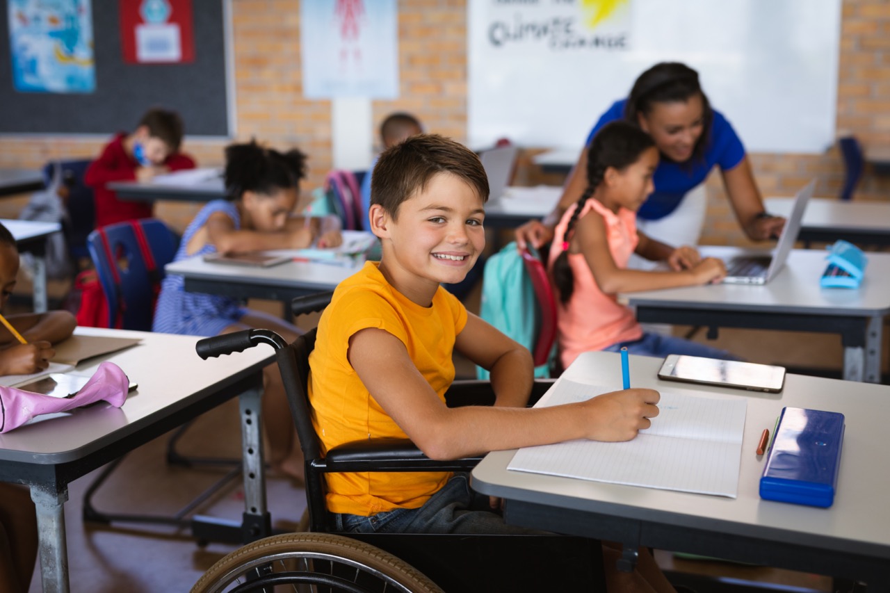 portrait-of-disabled-caucasian-boy-smiling-while-s-2025-04-03-22-26-52-utc Large
