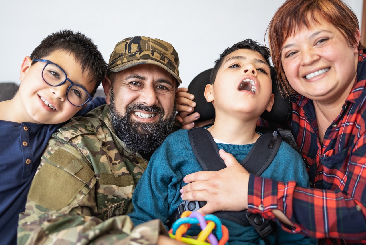 portrait-of-military-family-at-home-2024-12-05-15-46-20-utc Large